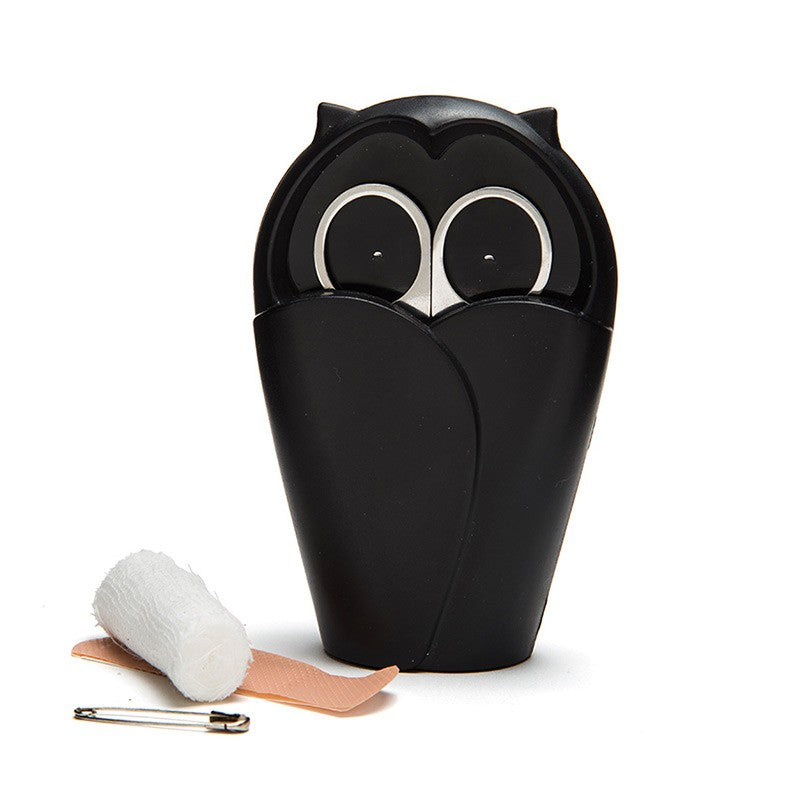 Nail scissors holder shaped as an owl