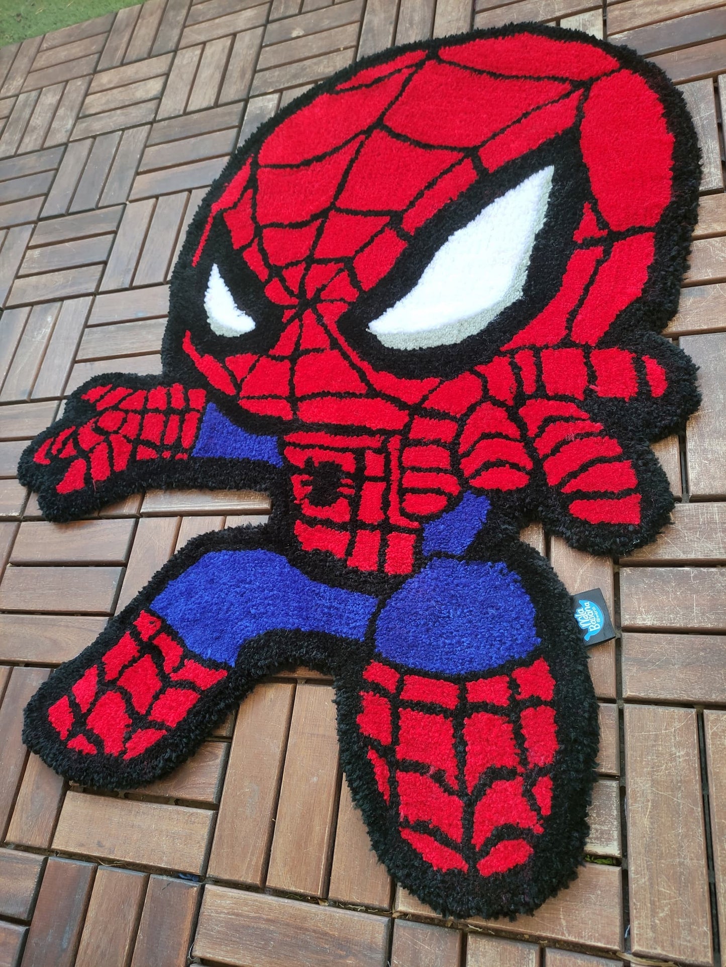Carpet in the shape of spidey
